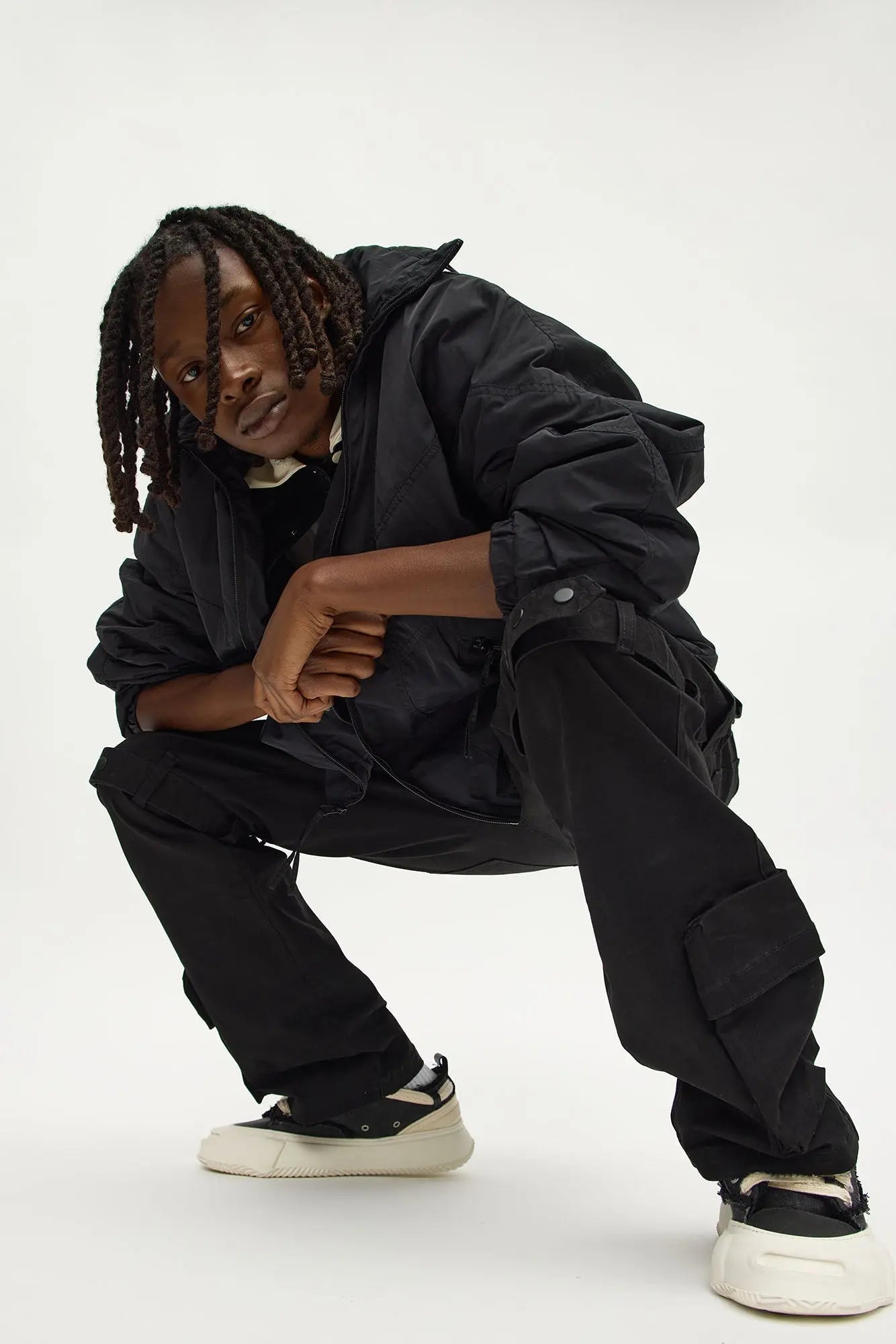 Boxy Paneled Funnel Windbreaker Jacket - Black