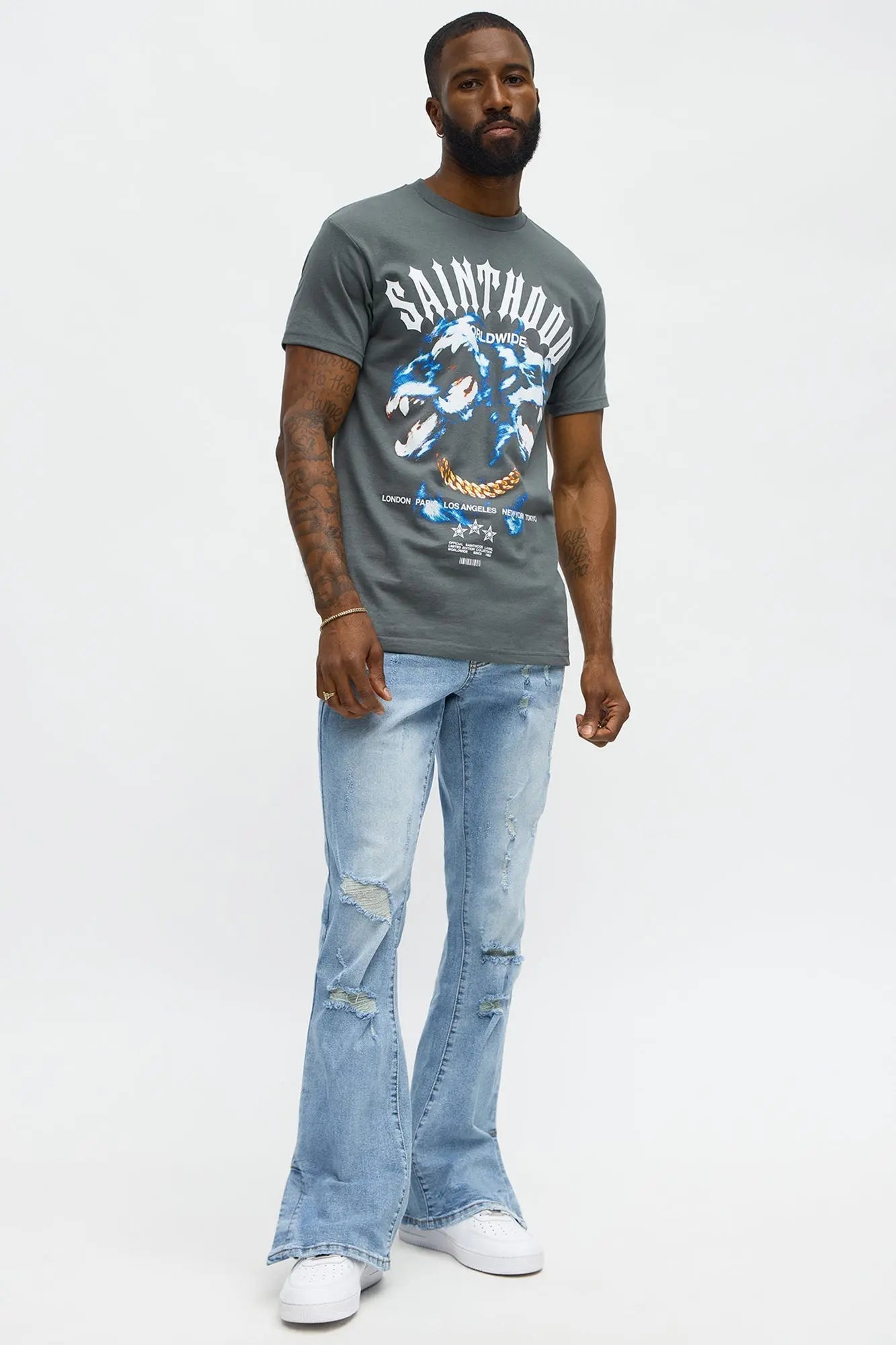Stacked Skinny Flare Slit Rebel Against Distressed Jean - Light Wash