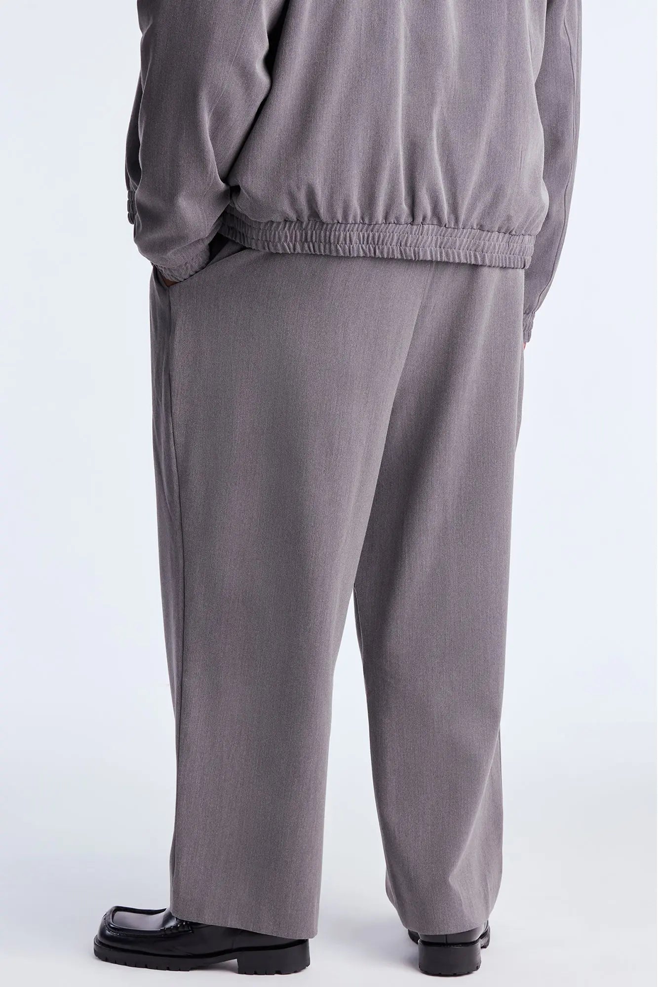 Baggy Upper East Side Asymmetrical Button Trouser - Charcoal