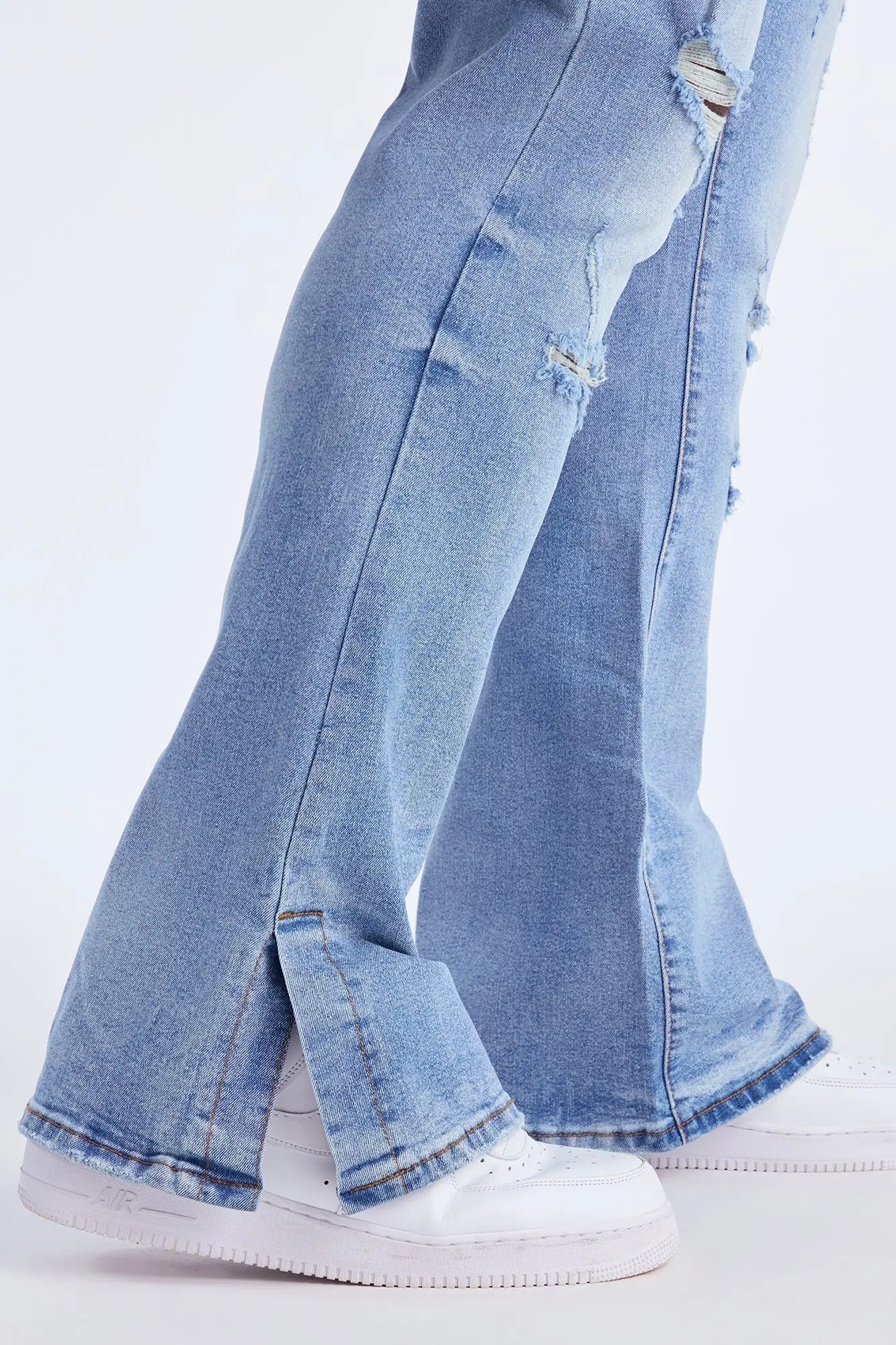 Stacked Skinny Flare Slit Rebel Against Distressed Jean - Light Wash